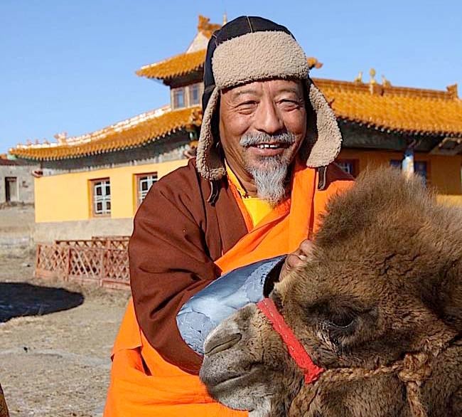 Rinpoche and friend during one of his remote missions to Mongolia. Rinpoche teaches in remote areas of Mongolia often only accessible by horse or four-wheel drive.
